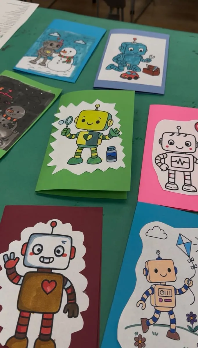 Handmade greeting cards decorated with cartoon robots.